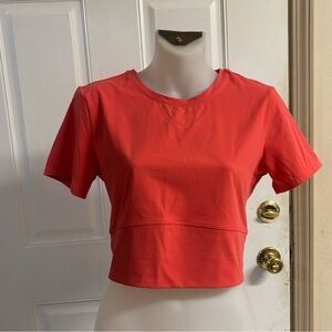Med Lab Joy Coral Short Sleeve Criss Cross back athletic Crop top.  In EUC!
